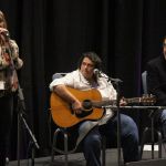 Kim Robins, Dawn Kenney, and David Morris sing in a songwriter showcase at Wide Open Bluegrass 2016 - photo by Frank Baker