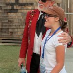 Doyle Lawson posing with a fan at the Outer Banks Bluegrass Festival - photo by Woody Edwards