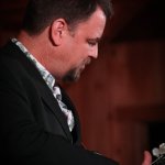 Rob McCoury with Travelin' McCourys at the August 2013 Gettysburg Bluegrass Festival - photo by Frank Baker