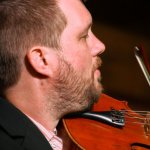 Clayton Campbell with The Gibson Brothers at the Gettysburg Bluegrass Festival (August 2014) - photo by Frank Baker