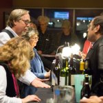 Tony Trischka and Ann Jefferson by the merch table at the 2013 California Banjo Extravaganza - photo by Steve Haimovitz
