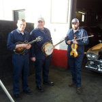 Wayne Benson, Steve Dilling and Justen Hayes from IIIrd Tyme Out don coveralls for the Pretty Little Girl From Galax video shoot - photo by Kendra Coomes