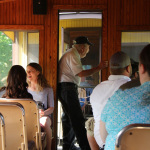 Riding the train at the 2016 Doyle Lawson & Quicksilver Bluegrass Festival - photo © Laura Tate Photography