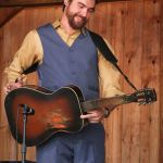 Brent Burke with Rhonda Vincent & The Rage playing a Dobro guitar that once belonged to Josh Graves at the August 2016 Gettysburg Bluegrass Festival - photo by Frank Baker