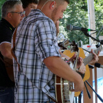 Justin Jenkins with Kenny & Amanda Smith at the 2016 Musicians Against Childhood Cancer festival - photo by Daniel Mullins
