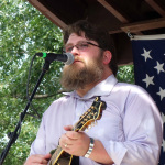 Nathan Livers with Michael Cleveland & Flamekeeper at the 2016 Musicians Against Childhood Cancer festival - photo by Daniel Mullins