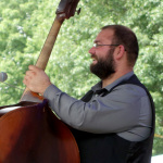 Tyler Griffith with Michael Cleveland & Flamekeeper at the 2016 Musicians Against Childhood Cancer festival - photo by Daniel Mullins