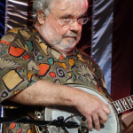 Rickie Simpkins with The Seldom Scene at the 2016 Musicians Against Childhood Cancer festival - photo by Daniel Mullins