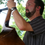 Zak McLamb with Alan Bibey & Grasstowne at the 2016 Musicians Against Childhood Cancer festival - photo by Daniel Mullins