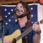 Cody Farrar with Breaking Grass at the 2016 Musicians Against Childhood Cancer festival - photo by Daniel Mullins