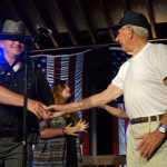 WWII vet Lawrence Fleming is honored at the 2016 Musicians Against Childhood Cancer festival - photo by Daniel Mullins