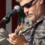 Wayne Benson with IIIrd Tyme Out at the 2016 Musicians Against Childhood Cancer festival - photo by Daniel Mullins