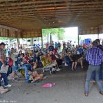 Mountain Faith performs under the shelter at the 2016 Milan Bluegrass Festival when rain shut down the stage show - photo by Bill Warren