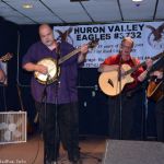 Mitch Manns on banjo at an Adams Family Benefit at the Huron Valley Eagles - photo by Bill Warren