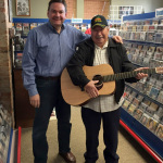 Festival producer Joe Mullins and Martin guitar winner Jim Holcomb. Photo courtesy of Classic Country Radio.