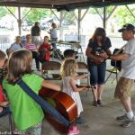 SMBGMA instrument petting zoo at the 2016 Charlotte Bluegrass Festival - photo © Bill Warren