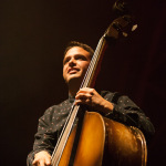 Bob Crawford with The Avett Brothers in Charlottesville 10/24/15 - photo © Gina Proulx