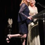 Claire Lynch and Laurie Lewis presenting at the 2016 International Bluegrass Music Awards - photo by Frank Baker