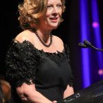 Nancy McFarlane speaks at the 2016 International Bluegrass Music Awards - photo by Frank Baker