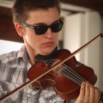 Christian Ward with Chris Stuart and Janet Beasley at the 2013 Delaware Valley Bluegrass Festival - photo by Frank Baker