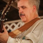 Eric Uglum with Chris Stuart and Janet Beasley at the 2013 Delaware Valley Bluegrass Festival - photo by Frank Baker