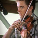 Christian Ward with Chris Stuart and Janet Beasley at the 2013 Delaware Valley Bluegrass Festival - photo by Frank Baker