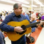 James Alan Shelton demonstrating a 1941 D-28 Martin which had been played for a time by Carter Stanley at Banjothon 2013 - photo © Dean Hoffmeyer