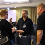 Carolyn and Daniel Routh with Lee Michael Demsey at World of Bluegrass 2014 - photo by Becky Johnson