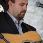 Joshua Richards with Michael Cleveland & Flamekeeper at Bluegrass On The Grass (July 13, 2013) - photo by Frank Baker
