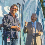 Dan Tyminski accepts the 2021 Bluegrass Star Award from the Bluegrass Heritage Foundation, presented by Alan Tompkins and Del McCoury (10/16/21) - photo by Nate Dalzell