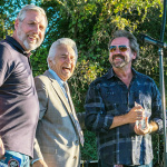 Dan Tyminski accepts the 2021 Bluegrass Star Award from the Bluegrass Heritage Foundation, presented by Alan Tompkins and Del McCoury (10/16/21) - photo by Nate Dalzell