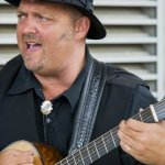 Allan Sanders with Coyote Hill Bluegrass at the 2014 Bluegrass and Chili Festival - photo by Tom Dunning