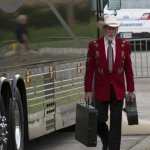 Doyle Lawson heads for the stage at the 2014 Bluegrass and Chili Festival - photo by Tom Dunning