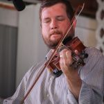 Clayton Campbell with The Gibson Brothers at the 2015 Delaware Valley Bluegrass Festival - photo by Frank Baker