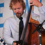 Mike Barber with The Gibson Brothers at the 2015 Delaware Valley Bluegrass Festival - photo by Frank Baker