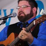 Dustin Myrtle with Doyle Lawson & Quicksilver at the 2015 Delaware Valley Bluegrass Festival - photo by Frank Baker