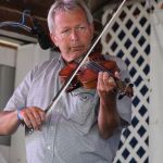 TJ Lundy with Danny Paisley & The Southern Grass at the 2015 Delaware Valley Bluegrass Festival - photo by Frank Baker