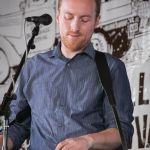 Justin Moses with Sierra Hull at the 2015 Delaware Valey Bluegrass Festival - photo by Frank Baker