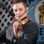 Andy Leftwich with Ricky Skaggs at the 2016 Delaware Valley Bluegrass Festival - photo by Frank Baker