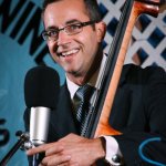 Alan Bartram with the Del McCoury Band at the 2013 Delaware Valley Bluegrass Festival - photo by Frank Baker