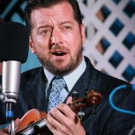 Jason Carter with the Del McCoury Band at the 2013 Delaware Valley Bluegrass Festival - photo by Frank Baker