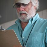 Bill Foster serves as MC at the 2016 Delaware Valley Bluegrass Festival - photo by Frank Baker