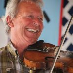 TJ Lundy with Danny Paisley at the 2016 Delaware Valley Bluegrass Festival - photo by Frank Baker