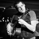 Andy Falco with The Infamous Stringdusters at Crossroad Music Hall; Huntsville, AL (3/9/13) - photo by Todd Powers