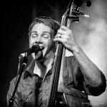 Travis Book with The Infamous Stringdusters at Crossroad Music Hall; Huntsville, AL (3/9/13) - photo by Todd Powers