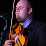 Dewey Brown with Ralph Stanley and the Clinch Mountain Boys at the 2014 Delaware Valley Bluegrass Festival - photo by Frank Baker