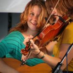 Celia Woodsmith and Kimber Ludiker with Della Mae at Delaware Valley (September 2012) - photo by Frank Baker