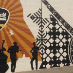 Custom mural being painted on the face of the Elderly Instruments building in Lansing, MI