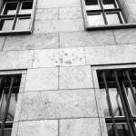 WWII bullet holes deface a building in Berlin seen during the Po' Ramblin' Boys' 2016 Back To The Mountains EuroTour