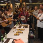 Mark Newton and Carl Jackson enjoy I Draw Slow at their merch table during Fan Fest 2012 - photo by Dan Loftin
